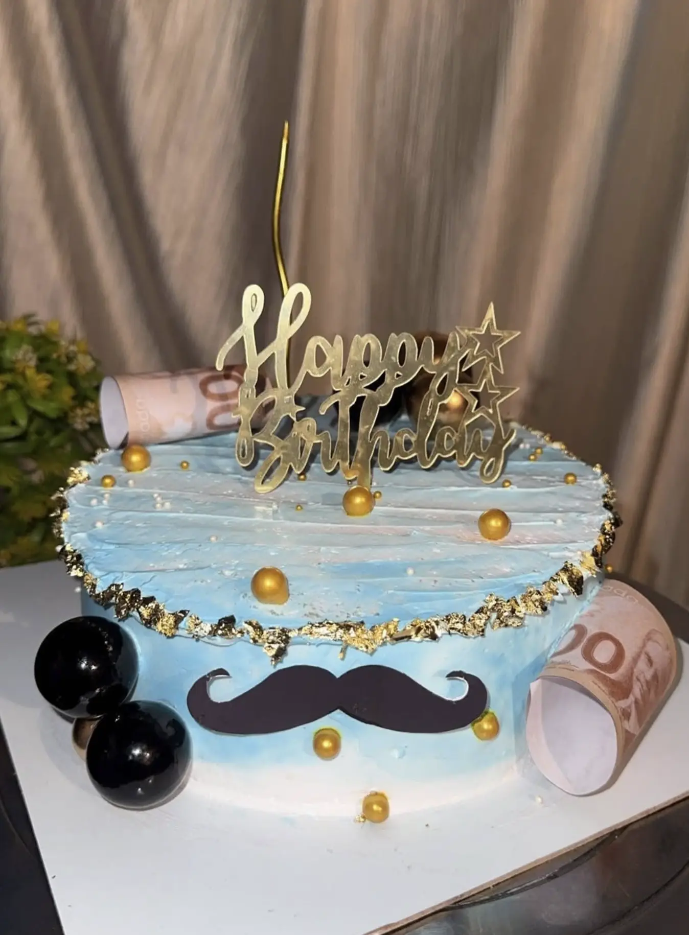 Light blue birthday cake with gold leaf and pearl detail by Kaur Bakehouse